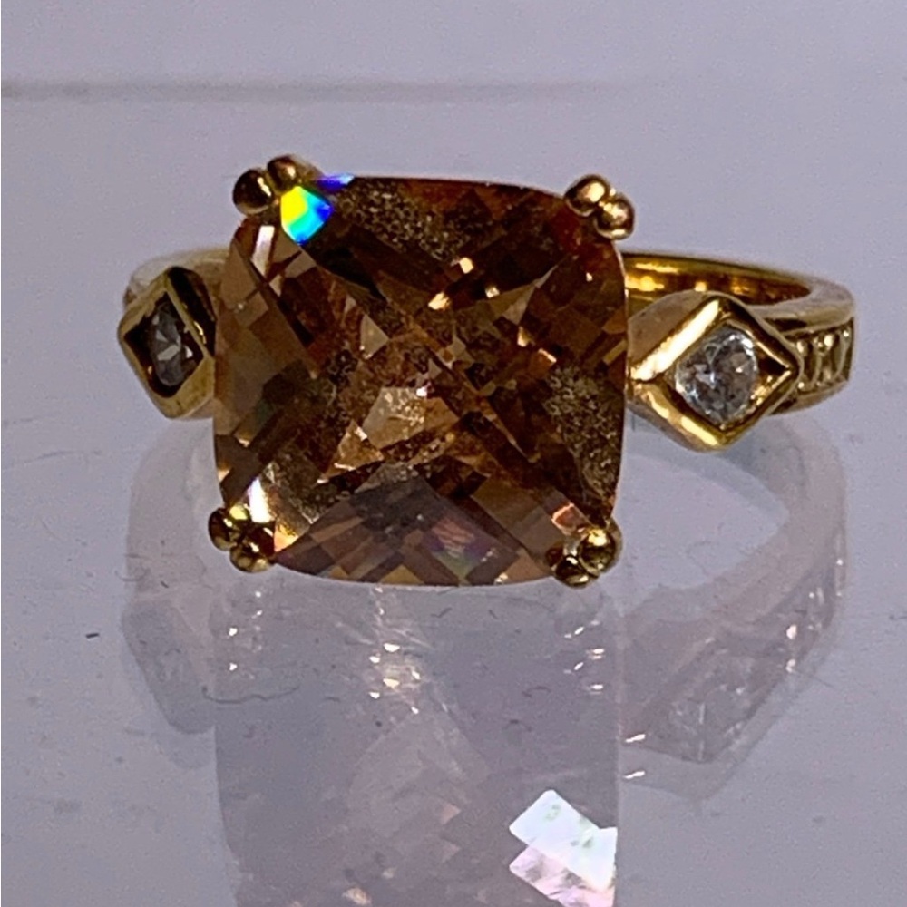Sophisticated Smoky Brown Gemstone Ring with Ornate Gold-Toned Band